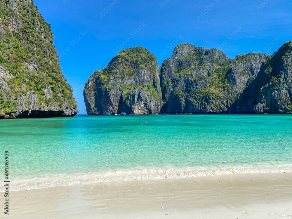 Beautiful scenery of Maya Bay beach on Phi Phi island, Krabi, Thailand. landmark, destination Southeast Asia Travel, vacation and holiday concept Beautiful scenery of Maya Bay beach on Phi Phi island, Krabi, Thailand. landmark, destination Southeast Asia Travel, vacation and holiday concept