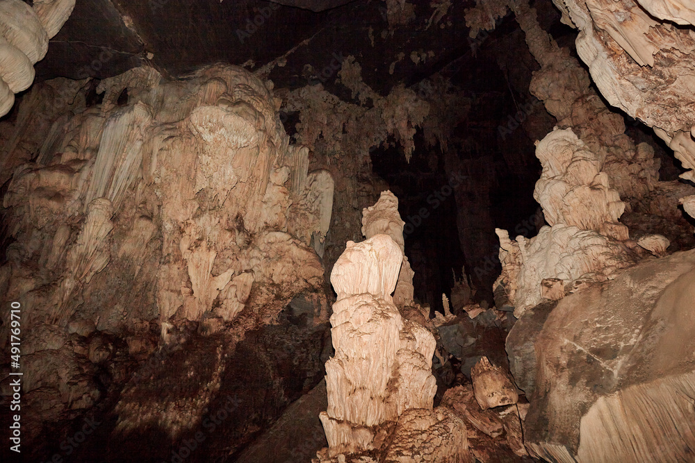 Fototapeta premium A beautiful of stalactite and stalagmite in Phu Pha Petch cave at Thailand 
