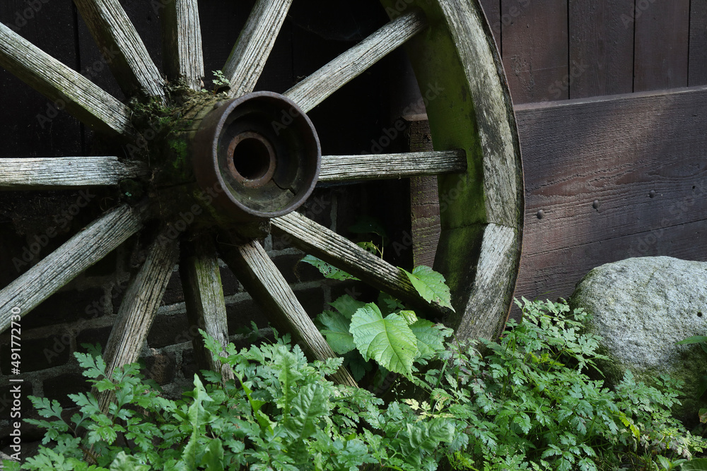 Close-up of an old wooden wagon wheel
Close-up of an old wooden wagon wheel