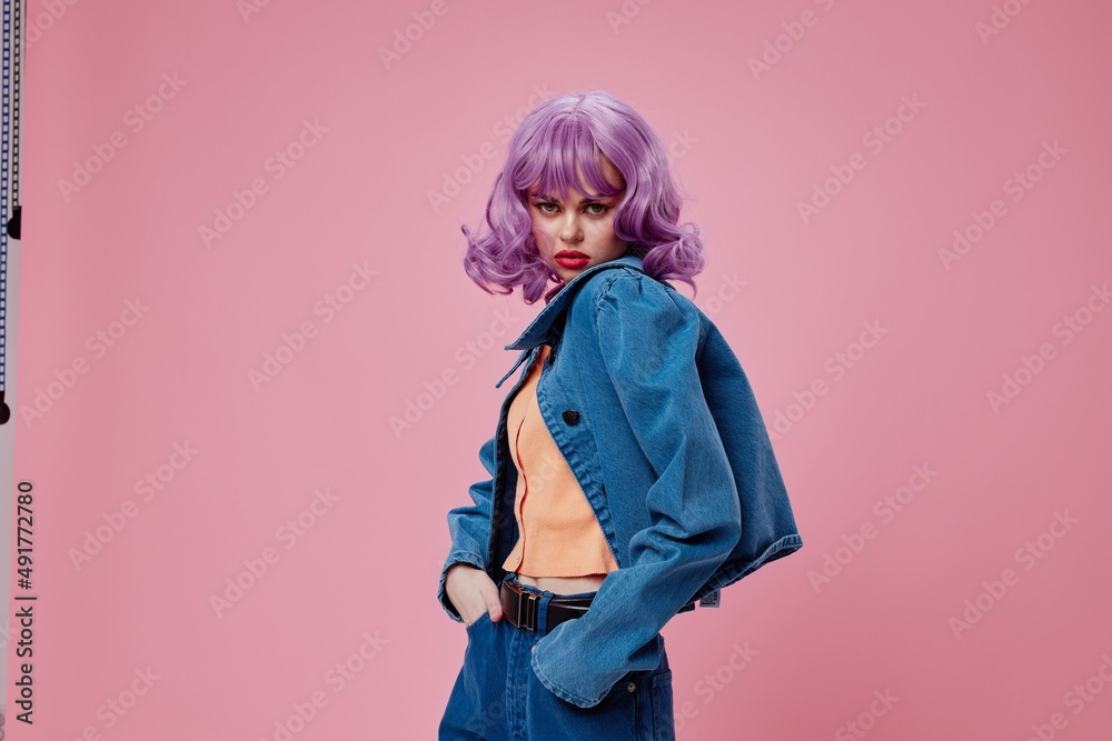 Pretty young female purple hairstyle red lips denim jacket fun studio model unaltered Pretty young female purple hairstyle red lips denim jacket fun studio model unaltered