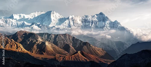 Obraz  z motywem Panoramic view of snow mountains range landscape