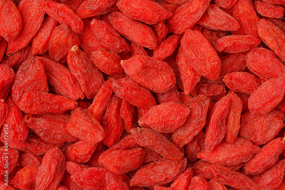 Goji berries texture, organic superfoods concept. Goji berries texture, organic superfoods concept.