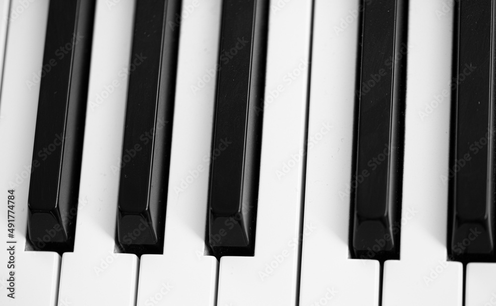 Naklejka premium piano keys close up