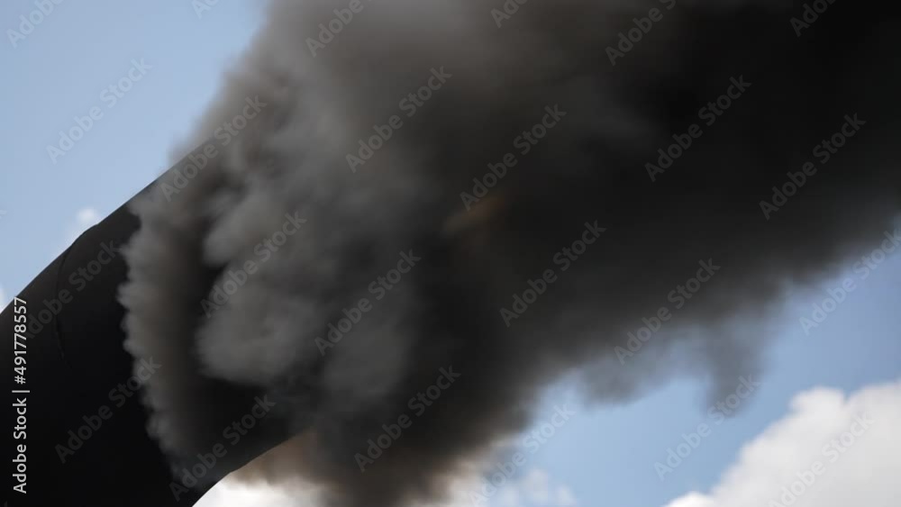 Vidéo Stock Black smoke from ferry boat flue in background, close up ...