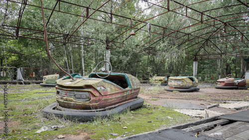 Rusty and deserted autodrome with foliage growing through it, Pripyat, Ukraine © Peter Kolejak