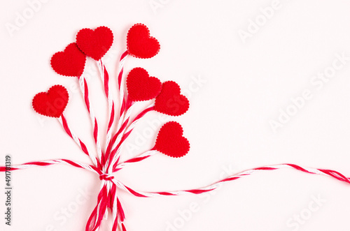 Fototapeta Naklejka Na Ścianę i Meble -  Red heart with rope on pink background.