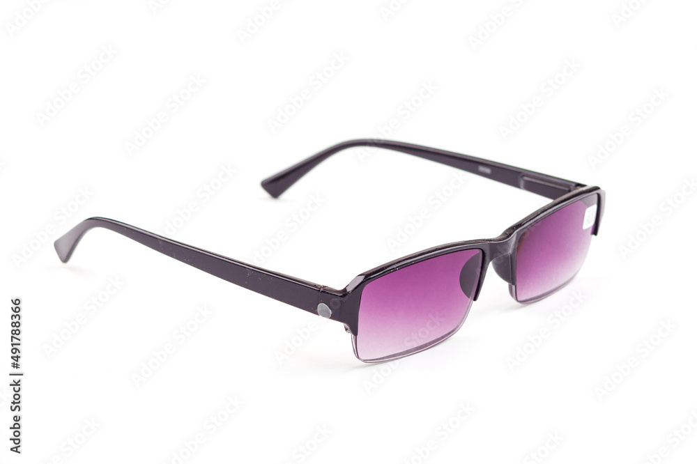 Fashionable sunglasses for women. burgundy glass. beautiful shape. Women's accessory.on a white isolated background. Fashionable sunglasses for women. burgundy glass. beautiful shape. Women's accessory.on a white isolated background.