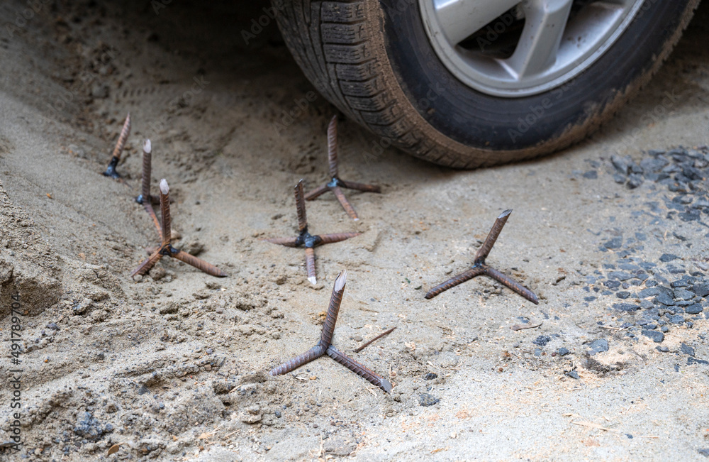 Spikes to puncture the tires of Russian military vehicles during the