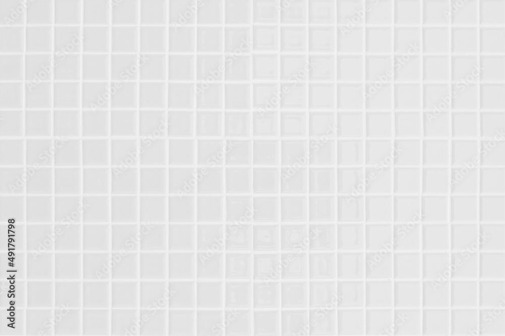 White or gray ceramic wall and floor tiles abstract background. Design geometric mosaic texture decoration of the bedroom. White or gray ceramic wall and floor tiles abstract background. Design geometric mosaic texture decoration of the bedroom.
