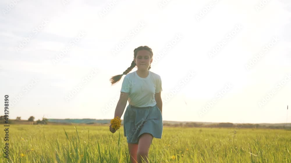Girl run in field on green grass. Happy child plays and dream. Girl in flower garden.Happy child run towards dream on green grass. Girl playing on flower field in garden.Children fun and joy in summer Girl run in field on green grass. Happy child plays and dream. Girl in flower garden.Happy child run towards dream on green grass. Girl playing on flower field in garden.Children fun and joy in summer