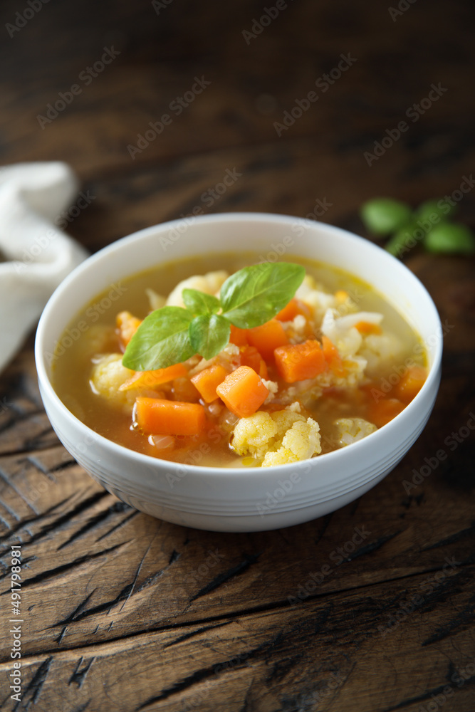 Homemade cauliflower soup with fresh basil Homemade cauliflower soup with fresh basil