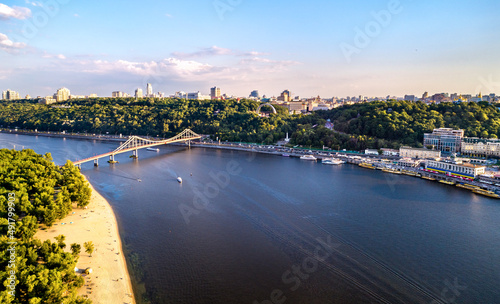 Aerial view of the Dnieper river with the Pedestrian Bridge in Kiev, Ukraine before the war with Russia