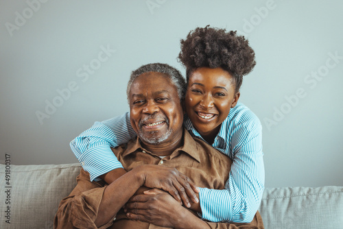 Canvas Print Close up faces of elderly 80s grandfather adult 30s granddaughter