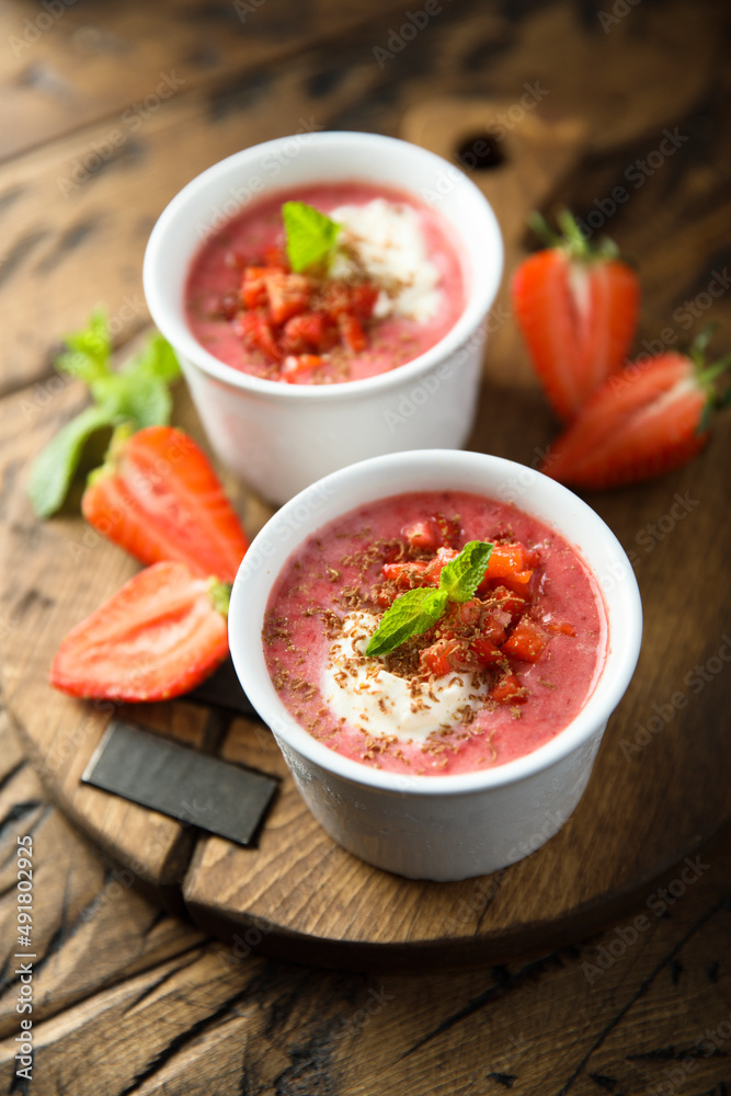 Homemade strawberry soup with chocolate and cream Homemade strawberry soup with chocolate and cream