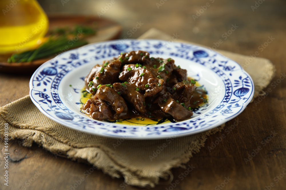 Homemade beef ragout with chives