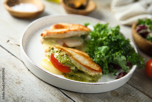 Chicken stuffed with pesto, tomato and cheese
