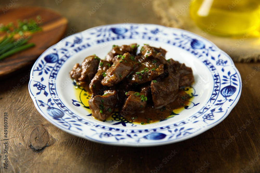 Homemade beef ragout with chives