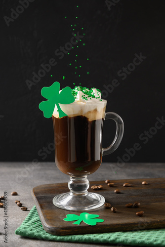 Patrick's Day Irish coffee with green sprinkles. Close up. Vertical format. photo