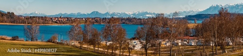 High resolution winter panorama with the austrian alps in the background at the famous Waginger See lake, Bavaria, Germany