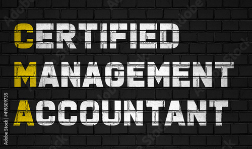Certified management accountant (CMA) concept,business abbreviations on black wall  photo