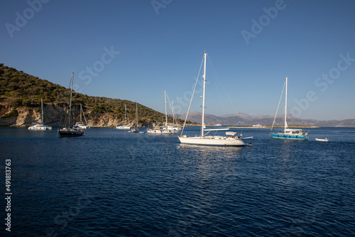Anchored sailboats off the coast of the KASTOS island  Lefkada Regional unit  Ionian Islands  Greece in summer morning.
