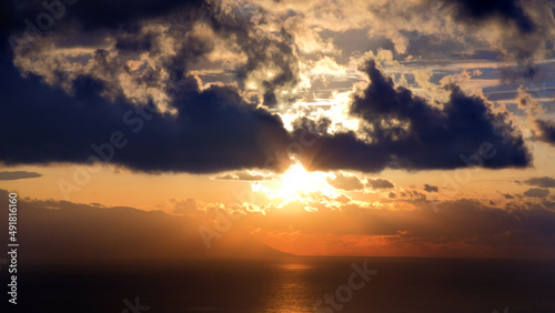 Beautiful sunset with clouds and sea