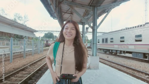 Young Asian woman tourism walking, sightseeing  in landmark city while travel on vacation alone. Asian young lesbian Lgbt relationship and travel concept for stock footage.