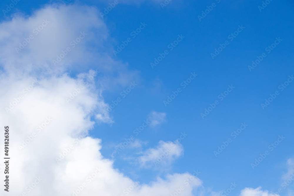 Clear blue color sky with white cloud background Clear blue color sky with white cloud background