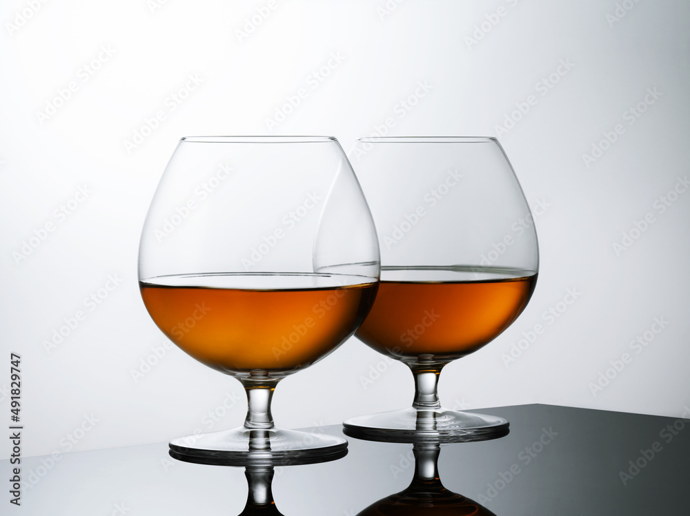 Glass of whiskey solated on white background Glass of whiskey solated on white background