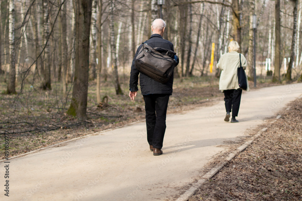 People are walking in the park.