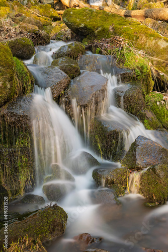 Long exposure of a part of the small waterfall Leyenbach in the Westerwald Germany in spring 