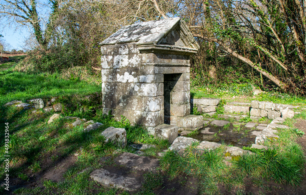 Carnac,France;26 February 2022:Fountain of the tumulus of Saint Michel, a site located in Morbihan in Brittany, the town is known for its alignments of 2,934 menhirs. Carnac,France;26 February 2022:Fountain of the tumulus of Saint Michel, a site located in Morbihan in Brittany, the town is known for its alignments of 2,934 menhirs.