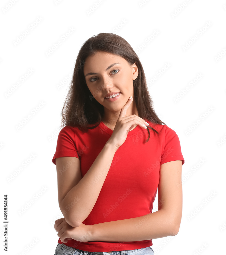 Pretty teenage girl with dental braces on white background Pretty teenage girl with dental braces on white background