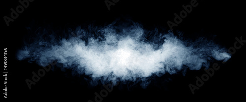 Smoke over black background. Fog or steam texture.