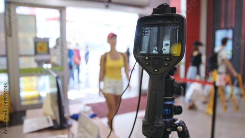 Wallpaper Mural Temperature check at a supermarket, grocery store with thermal imaging camera installed. Image monitoring scanner to monitor the body temp of visitor customer. Coronavirus pandemic outbreak. Covid-19. Torontodigital.ca