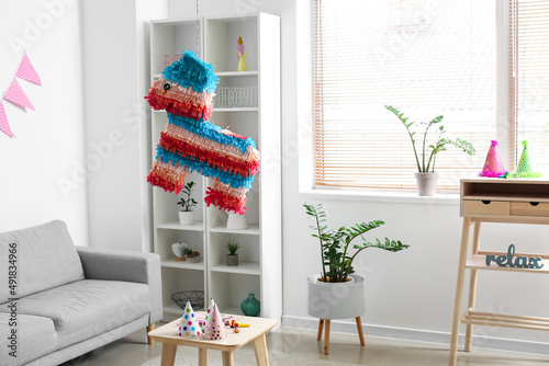 Mexican pinata hanging in l...