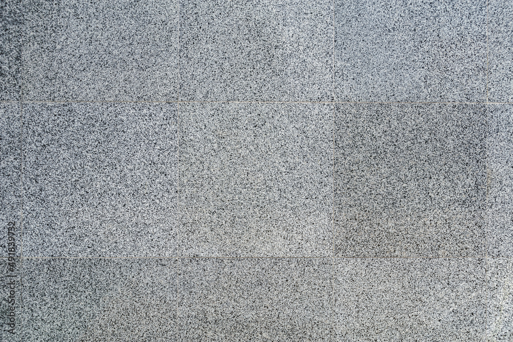 Fototapeta premium Background texture of gray granite slabs.
