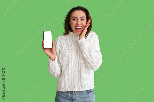 Emotional woman holding mob...