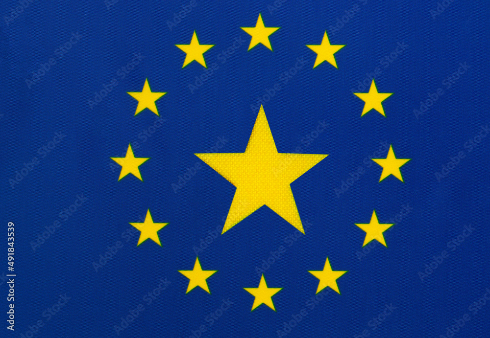 Star in the center of the European flag. Concept of entry into the European Union (EU) of a new state.