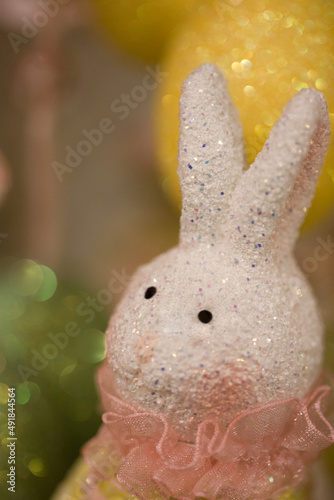 Easter Bunny decoration -- – abstract, macro, close-up, image focus technique, full frame, pastel with sparkles and glitter, holiday background 