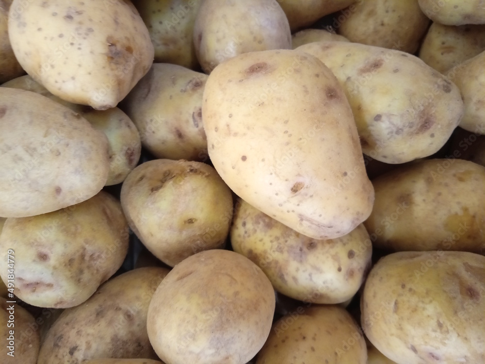 brown potatoes for sale in market, contain nutrition for carbohydrates brown potatoes for sale in market, contain nutrition for carbohydrates