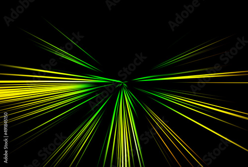 Abstract surface of blur radial zoom in yellow and green tones on a black background. Tricolor bright background with radial, diverging, converging lines .
