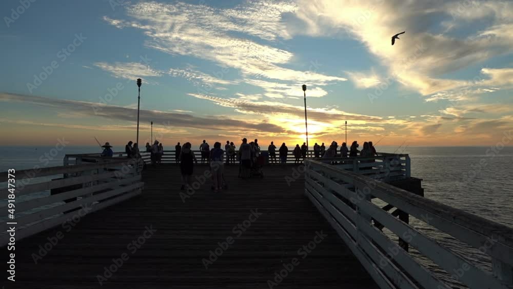 People watching the sunset on the pier in slow motion 120fps People watching the sunset on the pier in slow motion 120fps