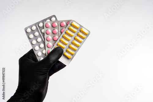 Pill for treatment. Hand wi...
