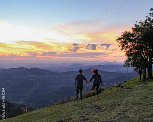 couple walking in the sunset