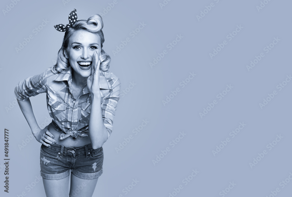 Portrait of beautiful happy smiling woman, dressed in pin up style. Caucasian blond girl posing in retro fashion and vintage concept. Black and white. Copy space. Portrait of beautiful happy smiling woman, dressed in pin up style. Caucasian blond girl posing in retro fashion and vintage concept. Black and white. Copy space.