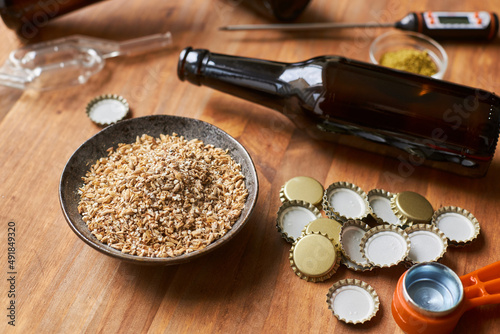 Bottle with supplies for making homemade beer