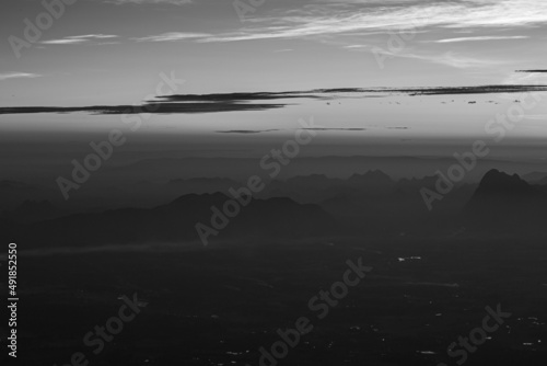 The landscape is a mountain with smog  black and white images