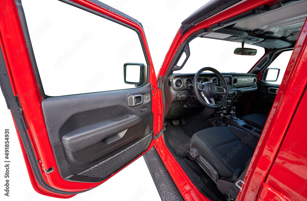 Open driver door in red offroad car