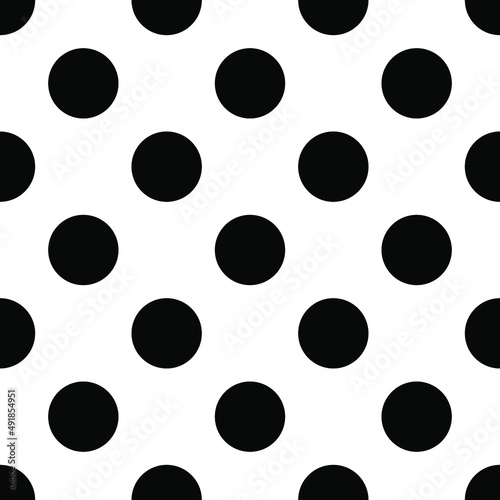 Polka dot seamless black and white vector pattern.